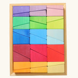 Grimm's sloping blocks building set in a wooden storage display tray.