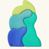 Back of the Grimm's casa aqua wooden toy stacking puzzle. Four piece simple wooden block puzzle toy in a mix of blue and green colours. 