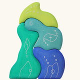Grimm's casa aqua wooden toy stacking puzzle. Four piece simple wooden block puzzle toy in a mix of blue and green colours. 