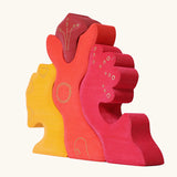Grimm's casa glora wooden toy stacking puzzle. 4 piece puzzle in a mix of red and yellow colours.
