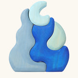 Back of Grimm's casa luna wooden stacking puzzle toy. Simple 4 piece blue blocks stacking toy. 