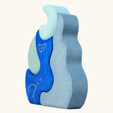 Side of Grimm's casa luna wooden stacking puzzle toy. Simple 4 piece blue blocks stacking toy. 