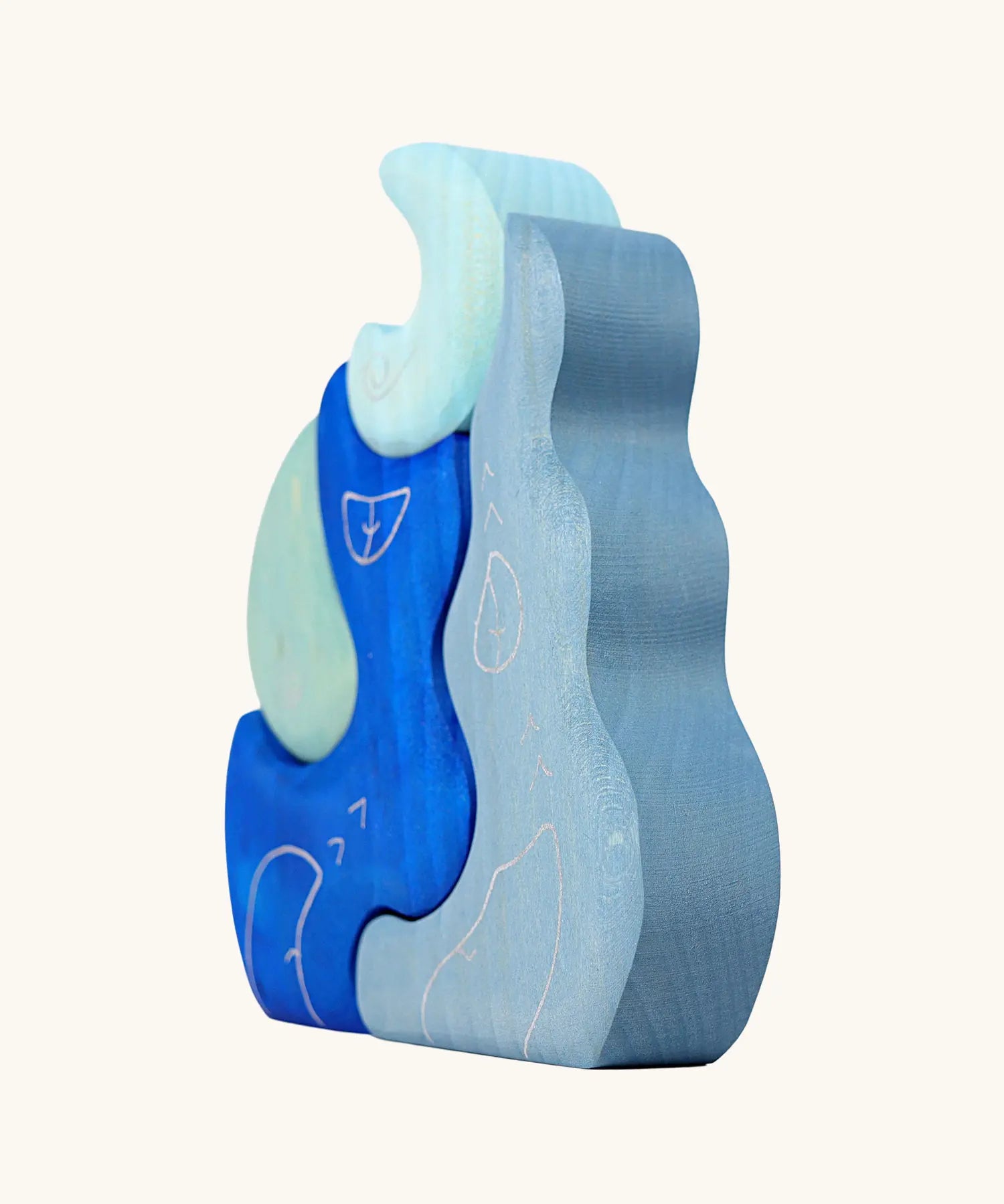 Side of Grimm's casa luna wooden stacking puzzle toy. Simple 4 piece blue blocks stacking toy. 