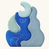 Grimm's casa luna wooden stacking puzzle toy. Simple 4 piece blue blocks stacking toy. 