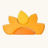 Back of the Grimm's casa sole sun shaped wooden stacking toy. Three piece puzzle.