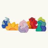 Collection of Grimm's casa wooden stacking puzzle toys. 