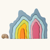 Grimm's cave arch stacker pastel wooden toy.