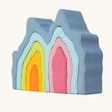 Grimm's cave arch stacker pastel wooden toy.