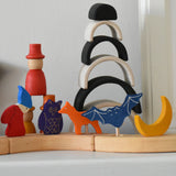 Grimm's celebration ring pieces in a line displaying various decorative figure including a fox, bat, moon owl and dwarf