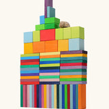 Tower built with the Grimm's colour charts rally wooden toy set. 74 piece rainbow coloured block set.