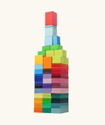 Tower built from the Grimm's colour charts rally wooden toy set. 74 piece rainbow coloured block set.