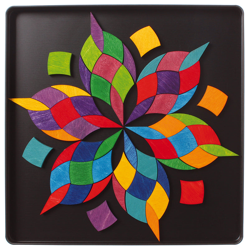 Grimm's colour spiral magnet puzzle usewd to create a mandala shape