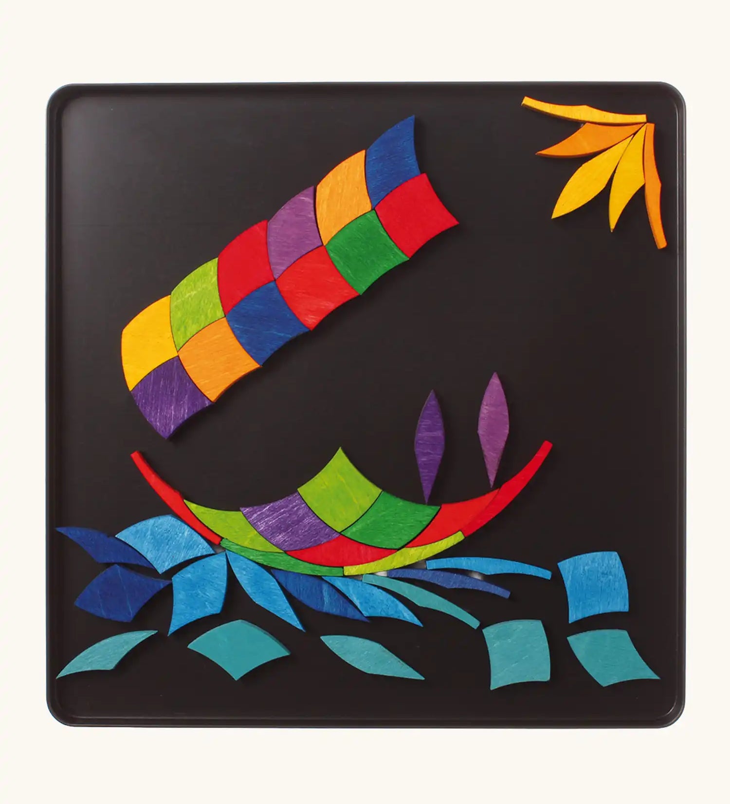 Grimm's colour spiral magnet puzzle used to create a boat scene.