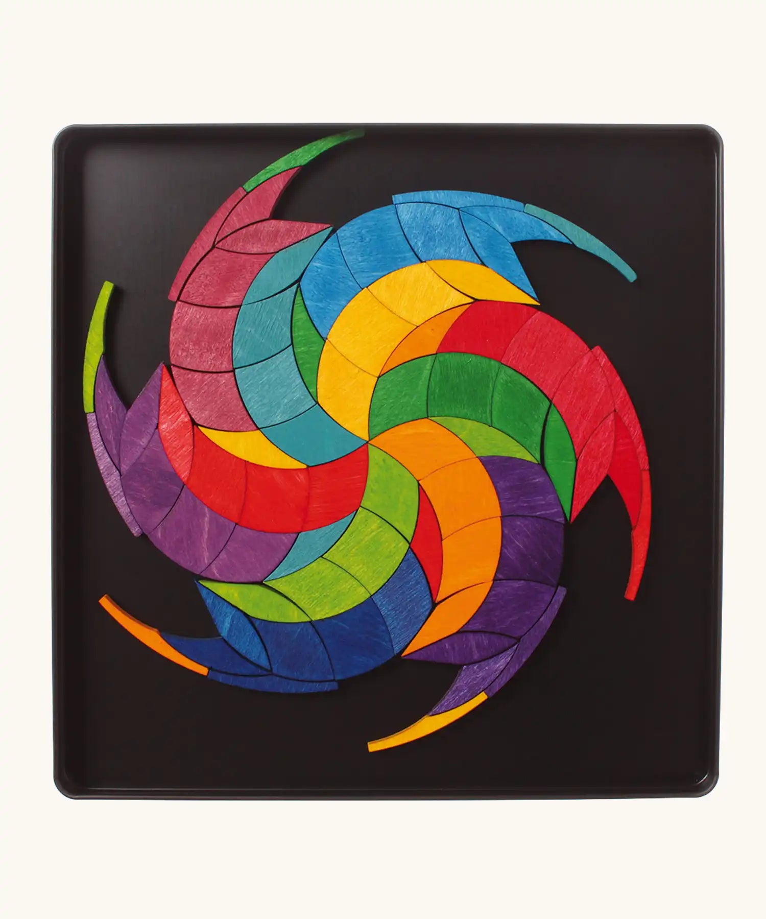 Grimm's colour spiral magnet puzzle used to create a pattern.