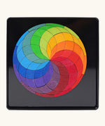 Grimm's colour spiral magnet puzzle in it's black metal tray.