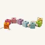 Grimm's Pastel Coloured Birthday Cubes Celebration Ring on a plain background. 