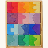 Grimm's concave finds convex wooden toy puzzle set.