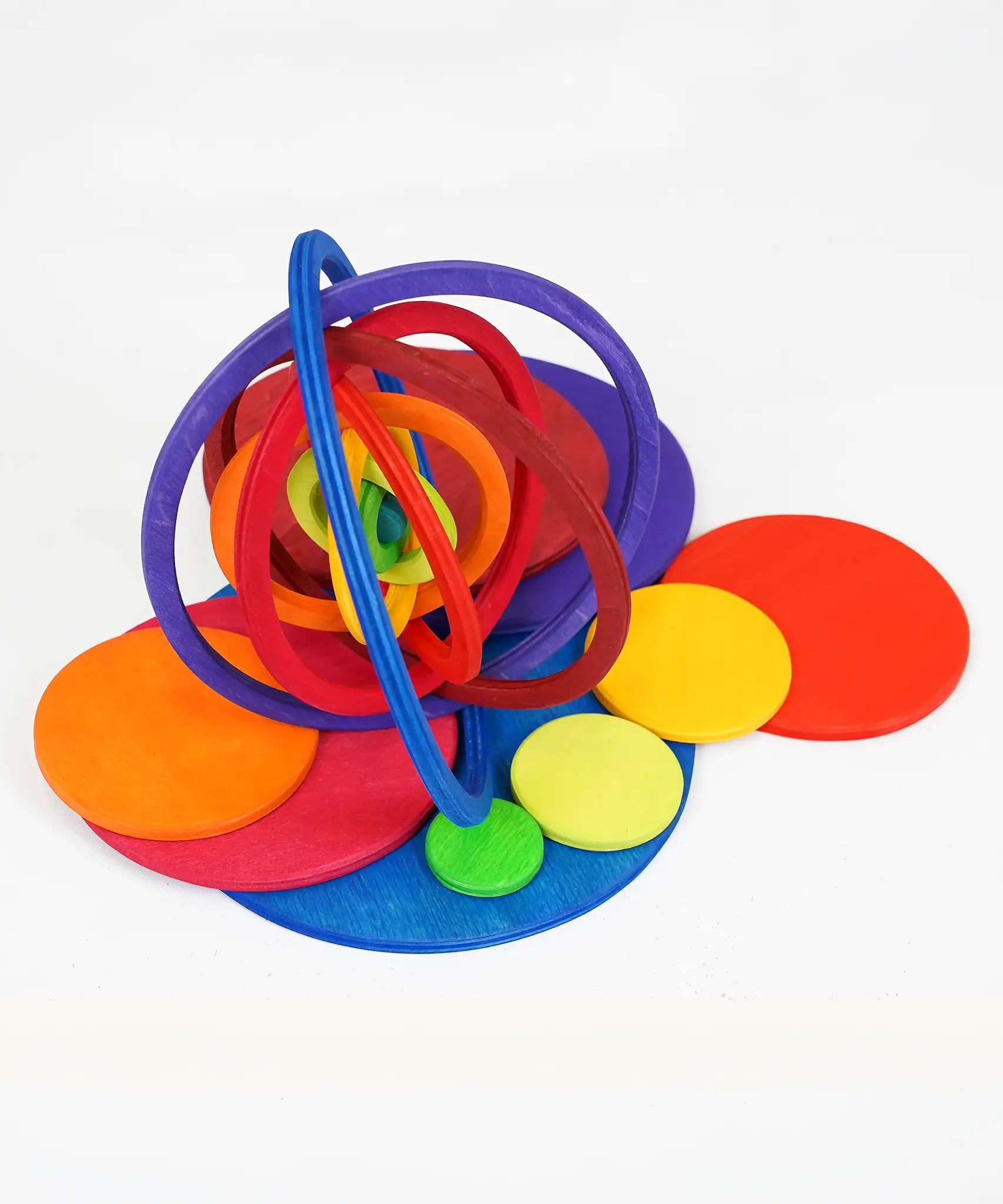A 3D structure made from the rings and standing on the disks of the Grimms concentric set in the counting by colour palette