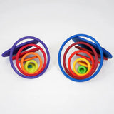 A pair of eyes using the disks and rings from the Grimms concentric set. 