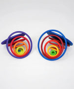 A pair of eyes using the disks and rings from the Grimms concentric set. 