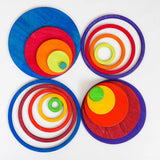 Grimms concentric set showing the rings and disk in counting by colour palette sorted into 4 piles 