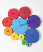 Overheard view of loose disk pieces and stand from the Grimms large conical tower in Grimm’s World of Numbers palette