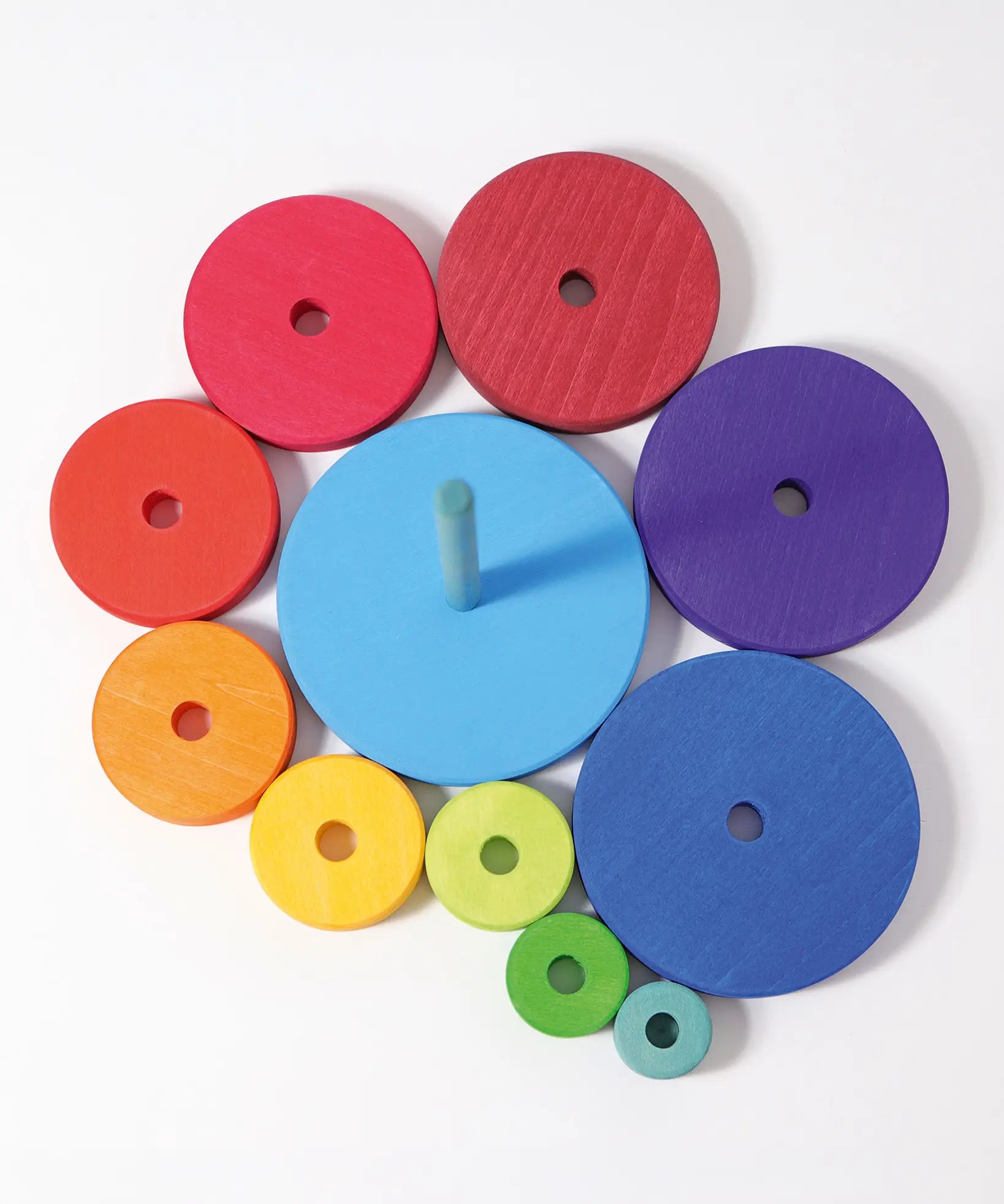 Overheard view of loose disk pieces and stand from the Grimms large conical tower in Grimm’s World of Numbers palette