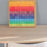 A Grimm's counting with colours educational block set in the frame standing upright on a desk