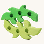 Grimm's Dark Green and Light Green Branches stacked on top of each other on their sides. 