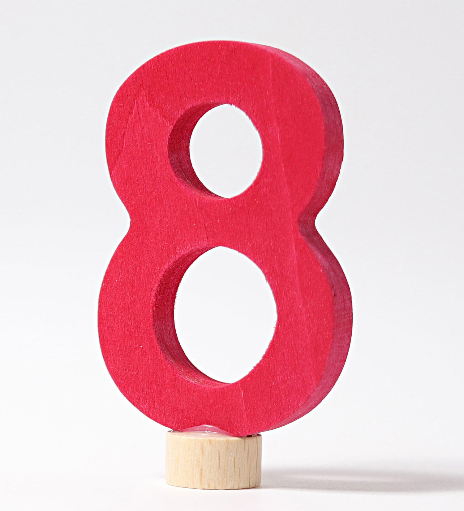 A red coloured number 8 decorative figure to fit a Grimm's celebration ring. These numbers are part of a large range of decorative figures available here at Babipur. 