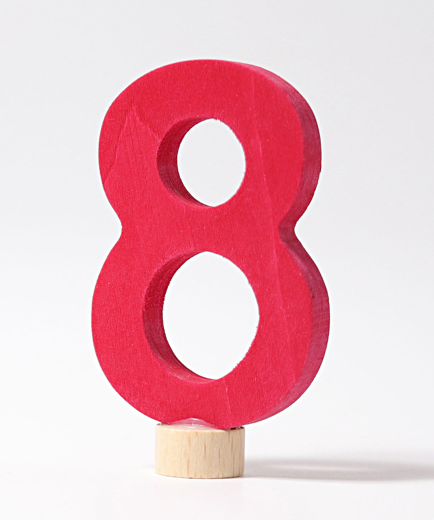 A red coloured number 8 decorative figure to fit a Grimm's celebration ring. These numbers are part of a large range of decorative figures available here at Babipur. 