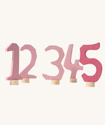 Grimm's Decorative Numbers Set 1-5 in shades of Pink. A wide range of Waldorf inspired celebration rings and decorative figures are available at Babipur.