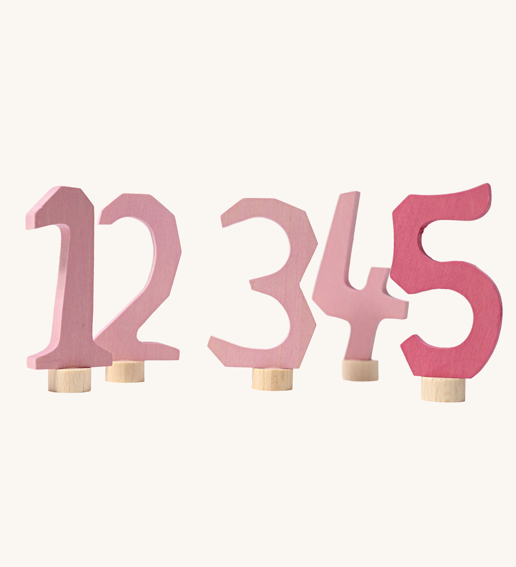 Grimm's Decorative Numbers Set 1-5 in shades of Pink. A wide range of Waldorf inspired celebration rings and decorative figures are available at Babipur.