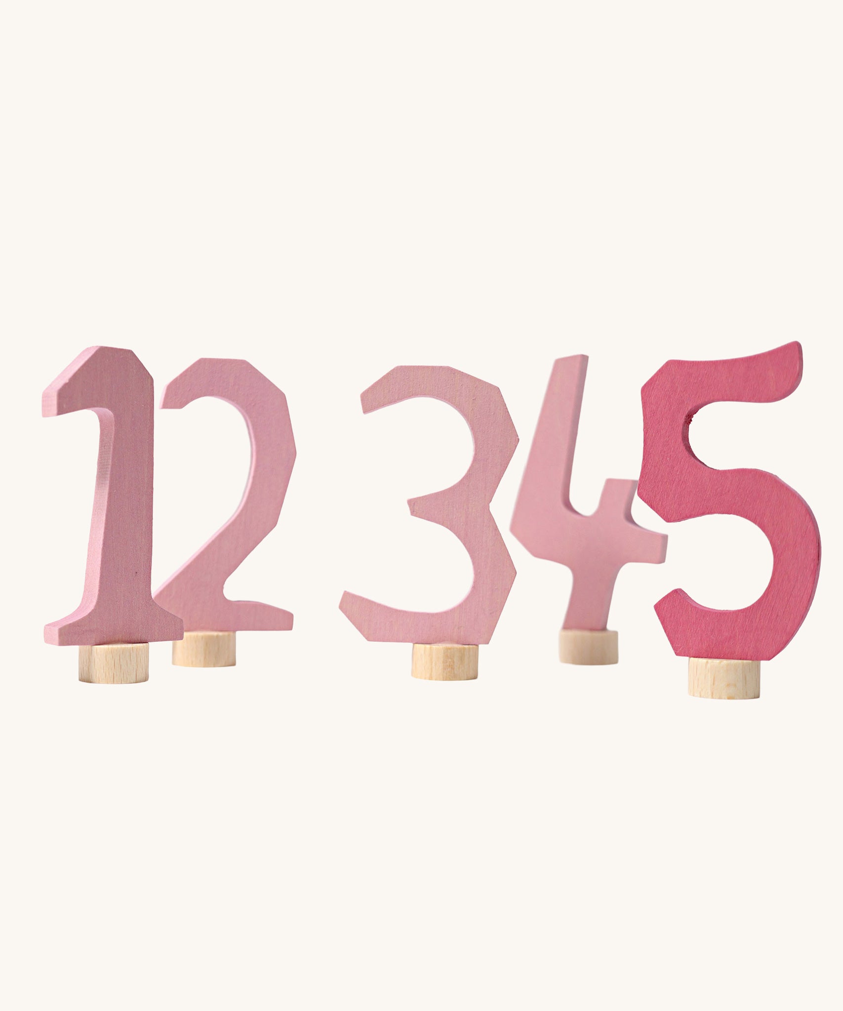 Grimm's Decorative Numbers Set 1-5 in shades of Pink. A wide range of Waldorf inspired celebration rings and decorative figures are available at Babipur.