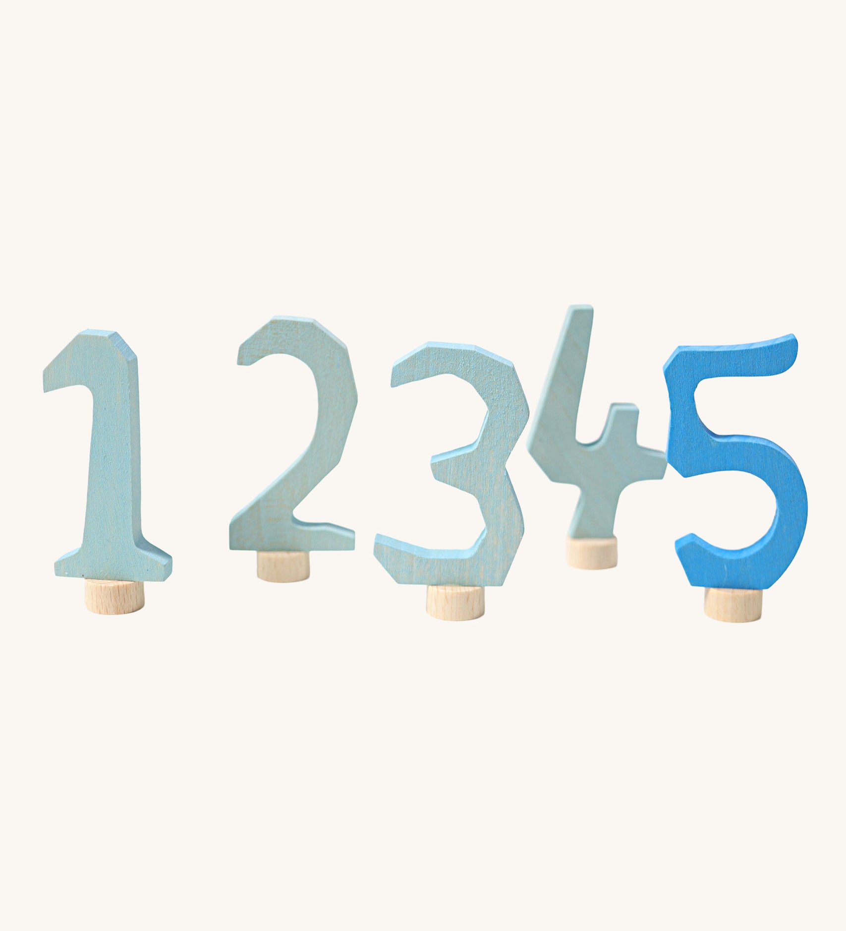 Grimm's Decorative Numbers Set 1-5 in shades of Blue. A wide range of Waldorf inspired celebration rings and decorative figures are available at Babipur.