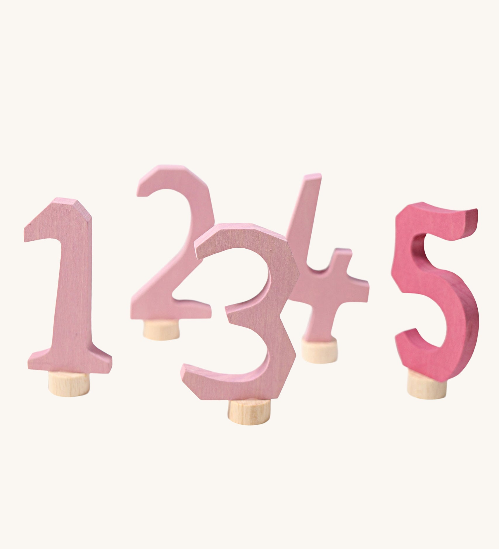 Grimm's Decorative Numbers Set 1-5 in shades of Pink. A wide range of Waldorf inspired celebration rings and decorative figures are available at Babipur.
