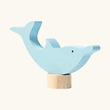 Front of Grimm's handcrafted wooden dolphin decorative figure showing hand painted eyes