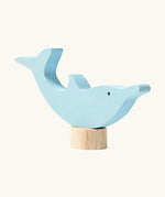 Front of Grimm's handcrafted wooden dolphin decorative figure showing hand painted eyes