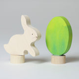 Grimm's Easter Decorative Figure Set featuring a white bunny rabbit a Batik Green coloured eggs. 
