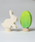 Grimm's Easter Decorative Figure Set featuring a white bunny rabbit a Batik Green coloured eggs. 