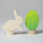 Grimm's Easter Decorative Figure Set featuring a white bunny rabbit a Batik Green coloured eggs. 