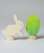 Grimm's Easter Decorative Figure Set featuring a white bunny rabbit a Batik Green coloured eggs. 