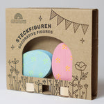 Grimm's Floral Duo pink and blue Easter Eggs Decorative Figure Set. The eggs are in the cardboard packaging sleeve. 