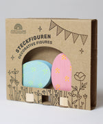 Grimm's Floral Duo pink and blue Easter Eggs Decorative Figure Set. The eggs are in the cardboard packaging sleeve. 