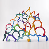 Pieces from the Grimms wooden fire, earth, water and rainbow sets