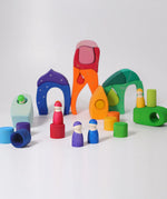 A playscene made from the Grimms fairytale village blocks and peg dolls