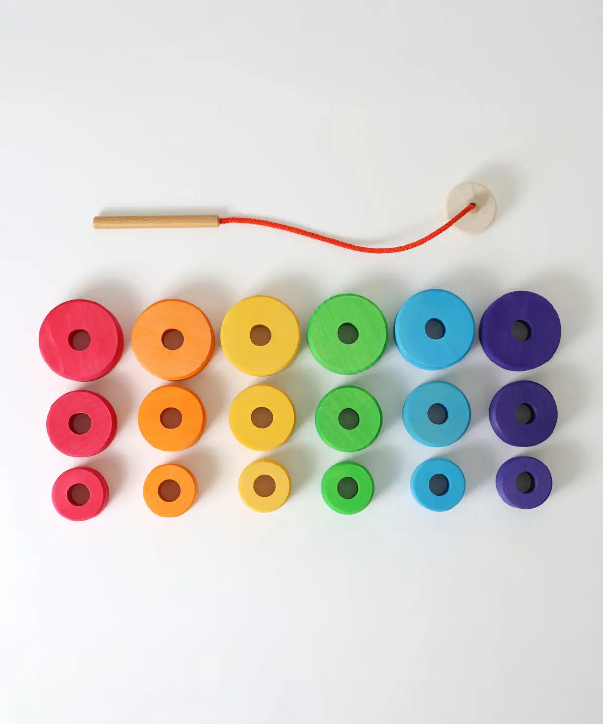 Loose Grimms handcrafted bright and chunky wooden disks in different size with a threading needle and string 