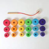Loose Grimms handcrafted bright and chunky wooden disks in different size with a threading needle and string 