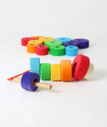 Grimms bright and chunky handcrafted wooden with threading needle and string through the holes