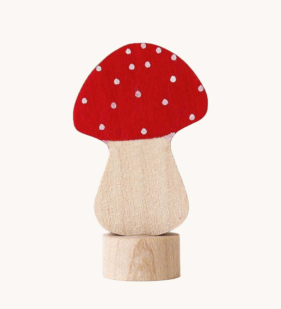 A Grimm's red and white fly agaric mushroom decorative figure for a celebration ring. 